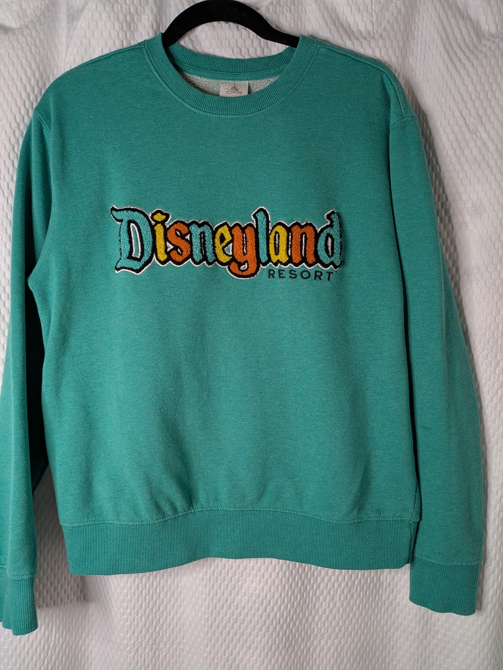 Disney Teal Crewneck Sweatshirt with Colorful Disneyland Logo